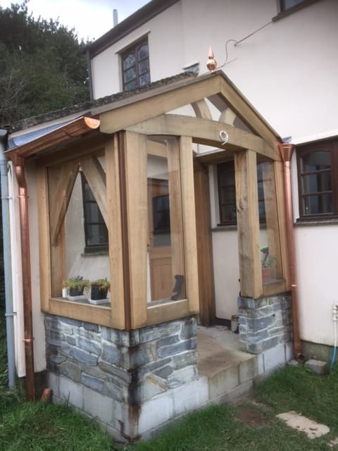 A beautiful timber porch in Cornwall by Philip Whear