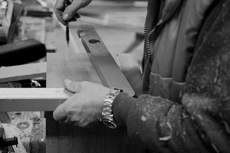 Philip Whear craftsman working on a made-to-measure product